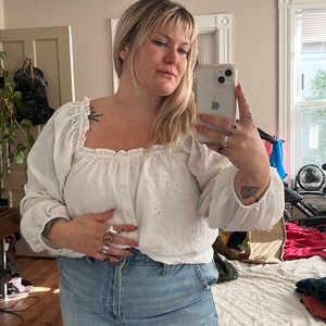 white embroidered ruffle off the shoulder top